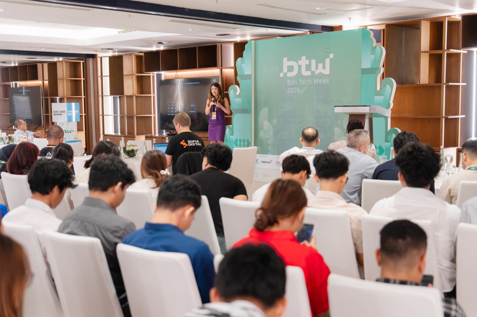 Claudia Natasia speaking on stage at Bali Tech Week 2026